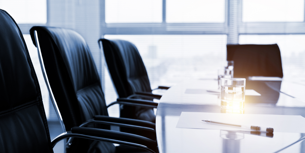 An empty table prepped for a business meeting
