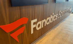 Fanatics Sportsbook logo on wood grain background