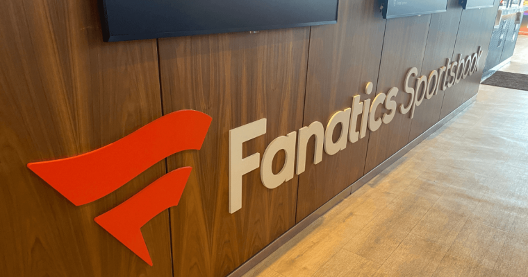 Fanatics Sportsbook logo on wood grain background