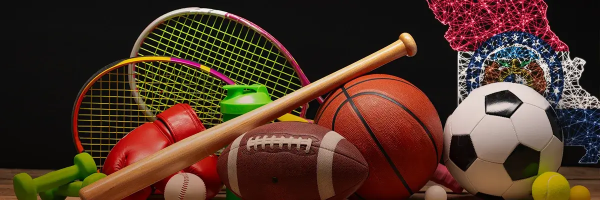 Various sports equipment including a soccer ball, football, tennis racket, and baseball gear